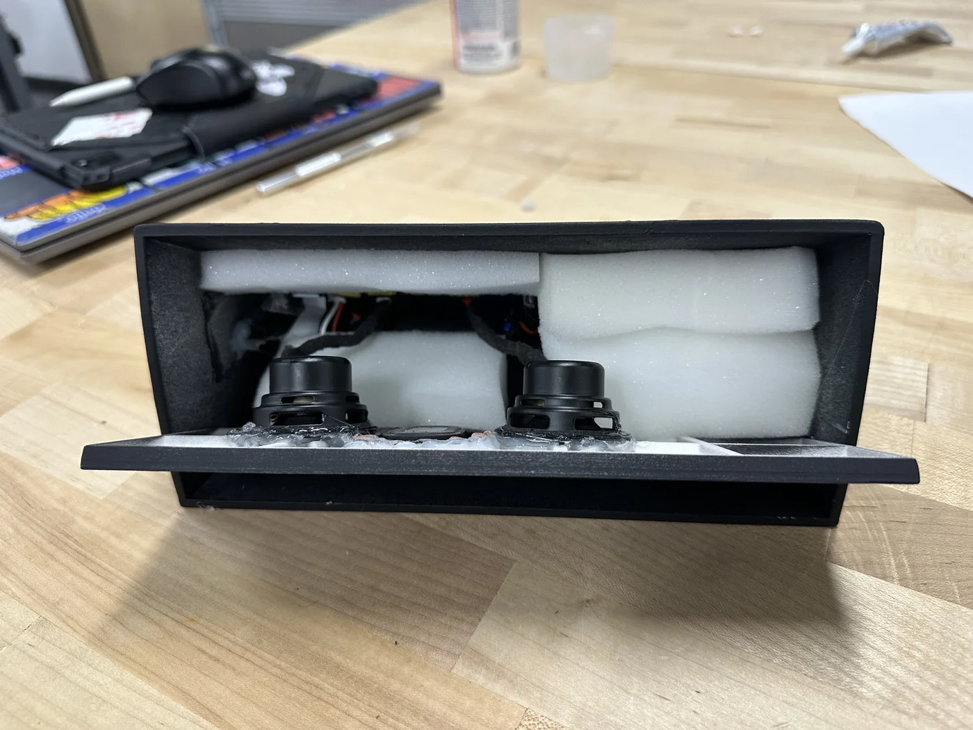 Printed speaker housing with two drivers set in white foam
